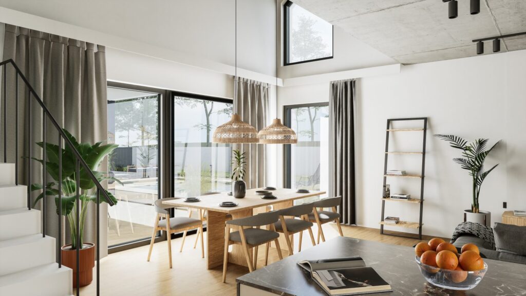 Jadalnia i salon w domu jednorodzinnym zaprojektowane jako spójna przestrzeń